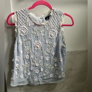 French connection light blue top with white beaded flowers